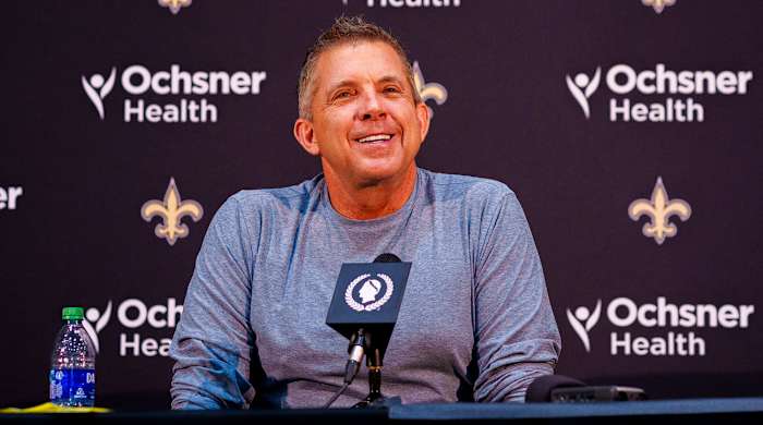 Sean Payton smiles at a Saints press conference.